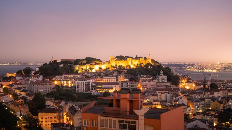 Sao Jorge Castle illuminated at twilight Lisbon