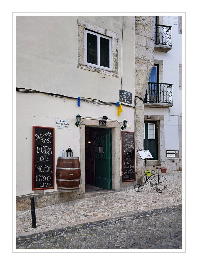 Fado performance with Portuguese guitar singer Lisbon