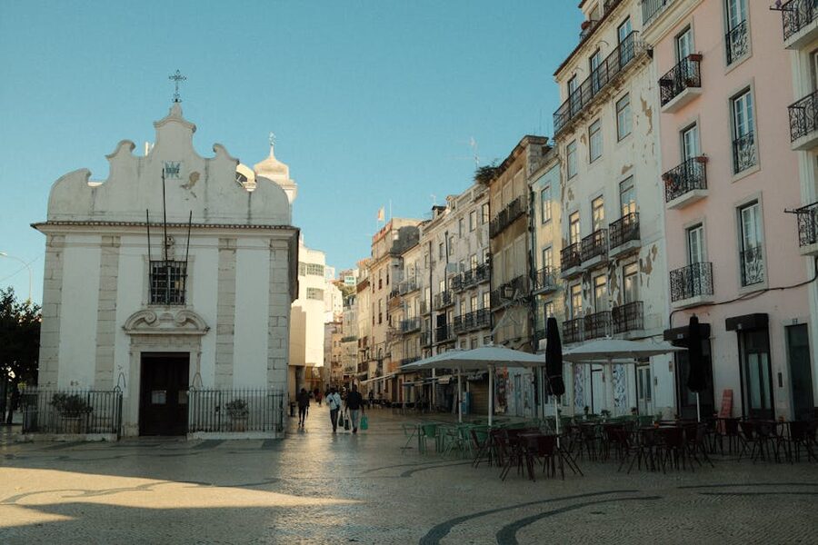 Quiet Lisbon tiled street in warm light