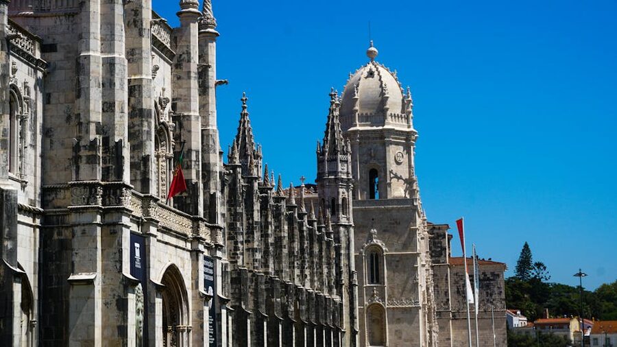 Jeronimos Monastery facade in Lisbon under blue sky