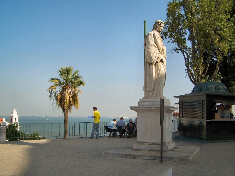Largo das Portas do Sol Lisbon viewpoint with tuk-tuks parked