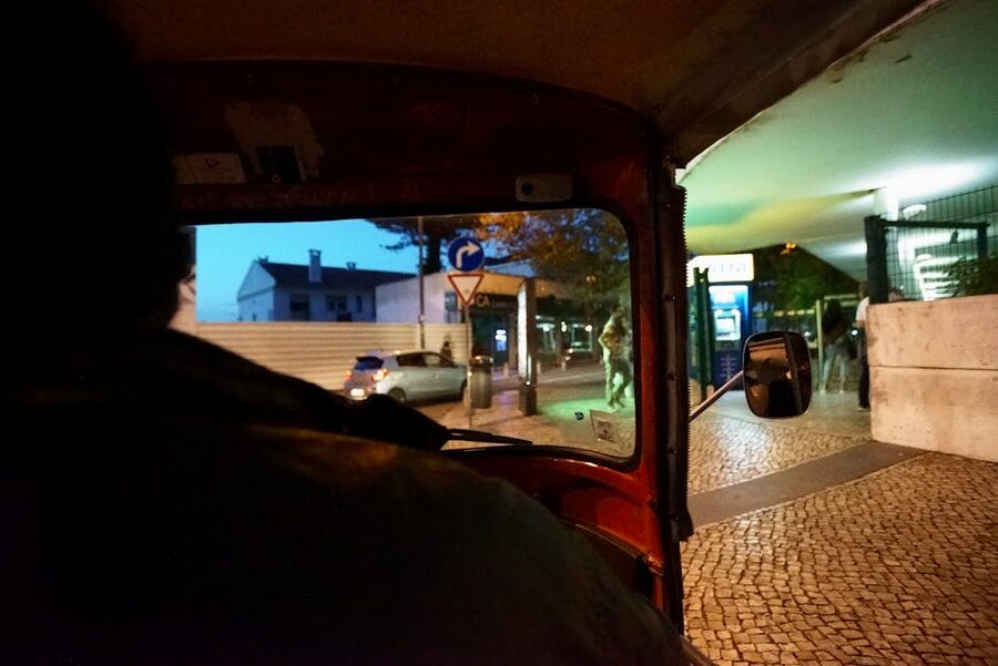 Passenger view from inside a Lisbon tuk-tuk