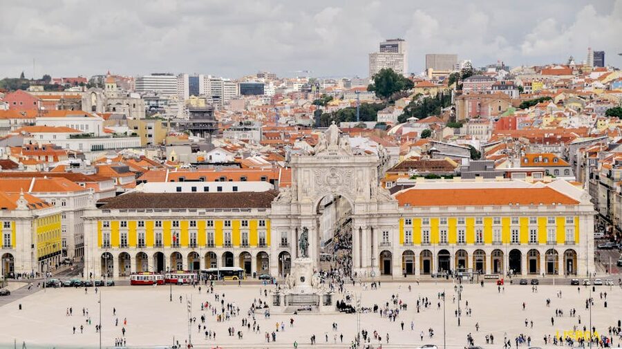 Praca do Comercio Lisbon with arch and yellow buildings