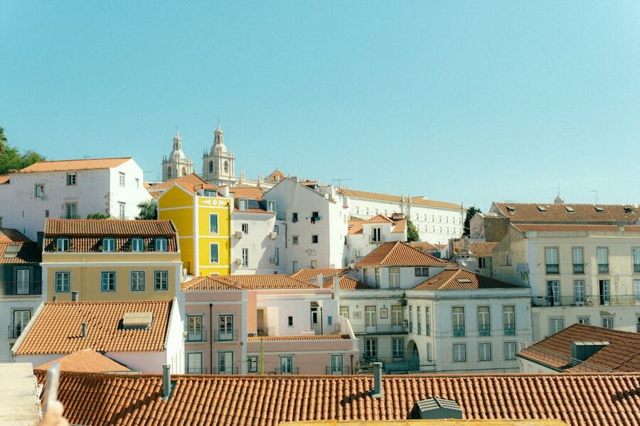 Lisbon historic rooftops in warm sunlight