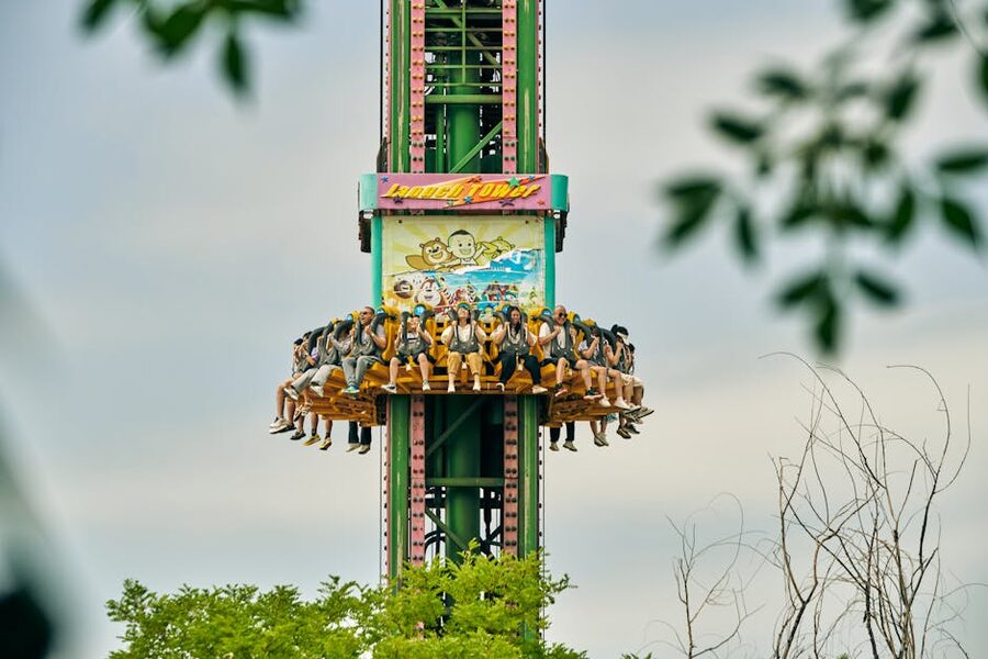 Drop tower freefall ride at amusement park reference