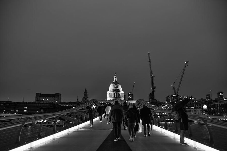Millennium Bridge London at night with St Pauls