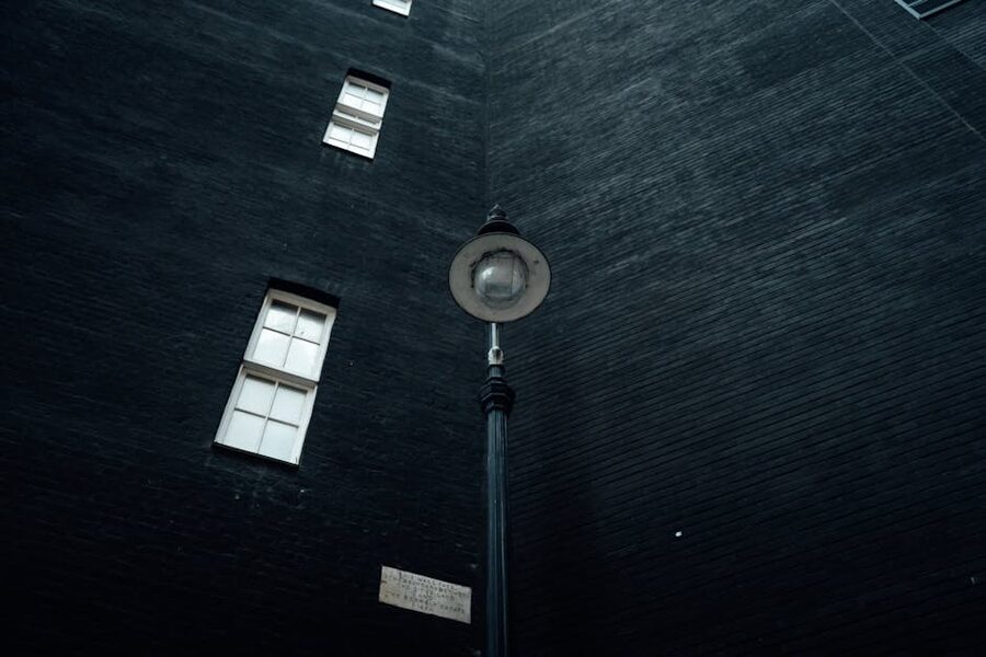 London street lamp against dark brick building