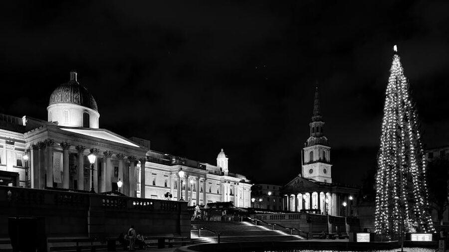 Trafalgar Square at night with National Gallery and Christmas decor