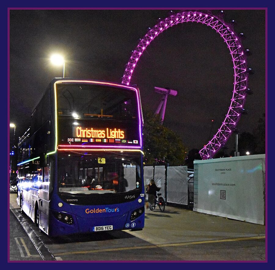 London Christmas lights tour bus at night with festive decorations