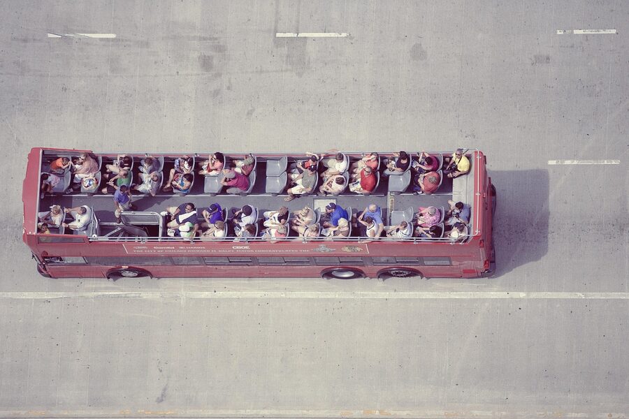 London open-top tour bus on a clear day