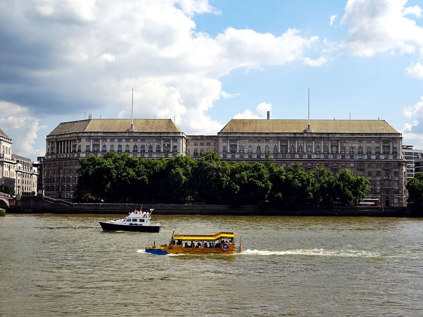 Thames River London with boats and historic architecture
