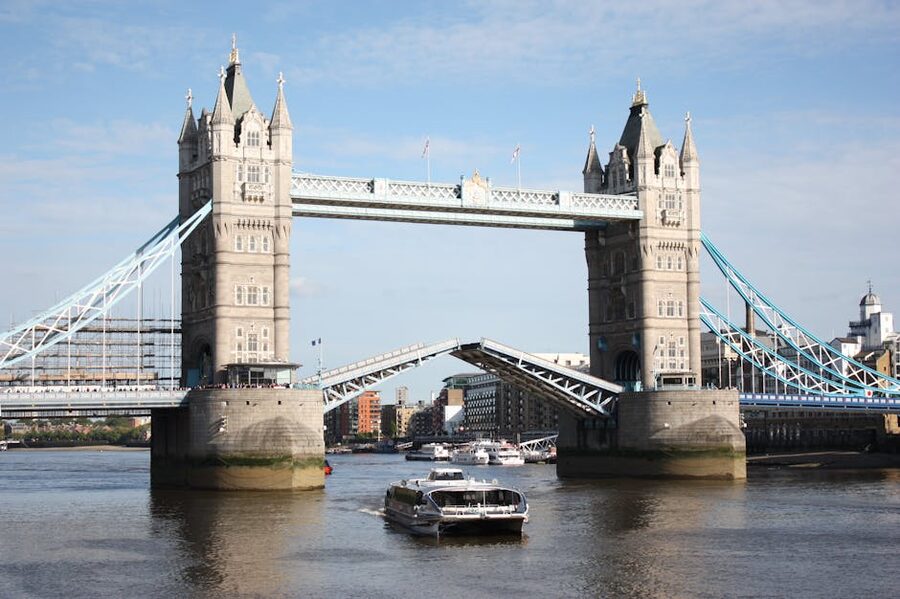 Tower Bridge raised for a tall vessel on the River Thames London