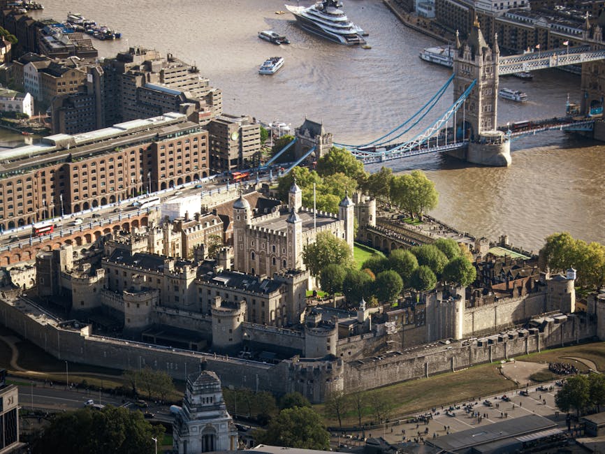 Aerial view of the Tower of London with Tower Bridge across the Thames
