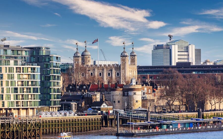 The Tower of London in front of the modern City of London skyline