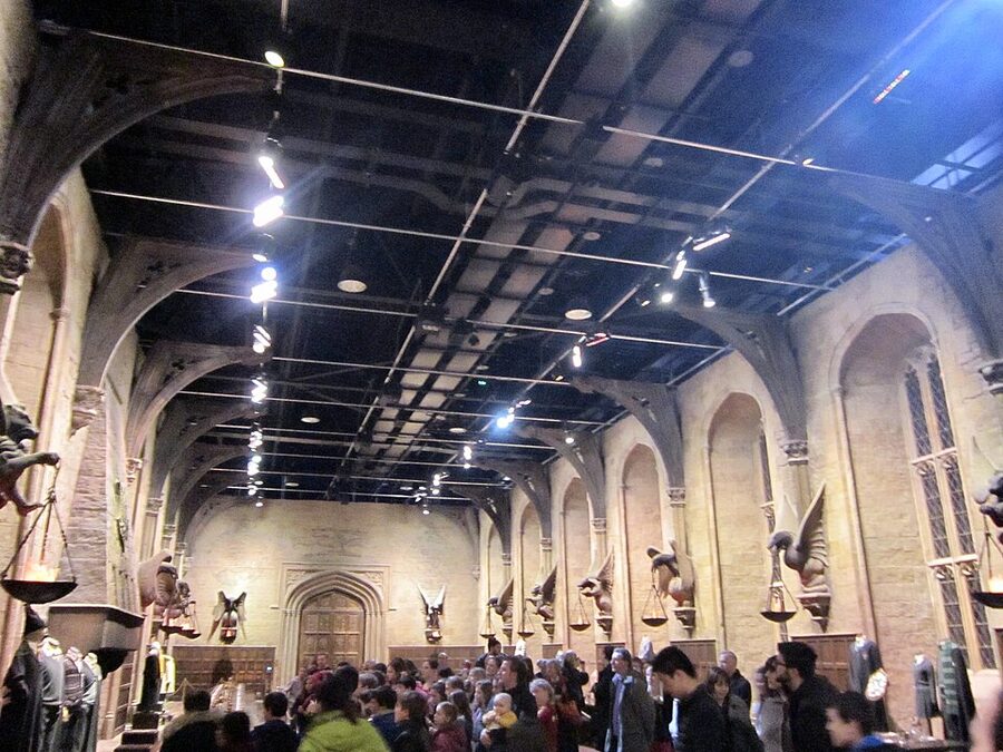 The Great Hall film set at Warner Bros Studio Tour London with long tables and floating candle effects