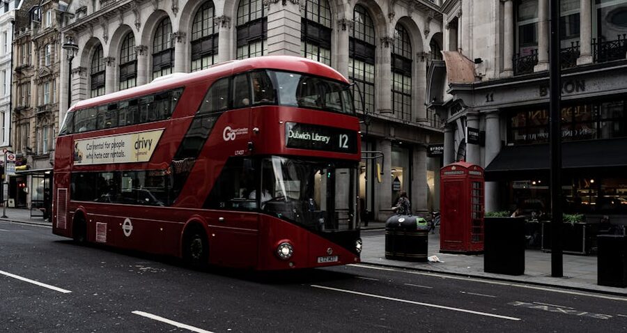 Red double-decker bus on a London street