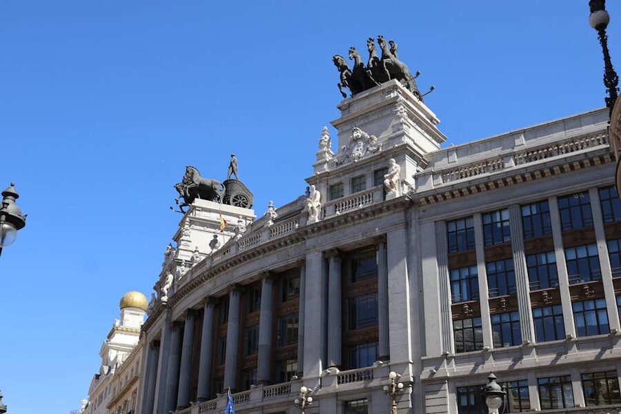 Historic architecture in Madrid under a blue sky
