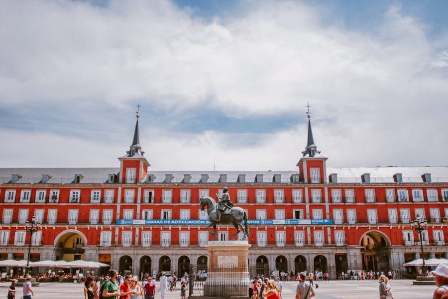 Plaza Mayor in Madrid with historic architecture and tourists