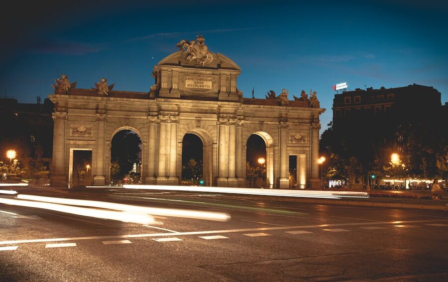 Puerta de Alcala illuminated at night in Madrid