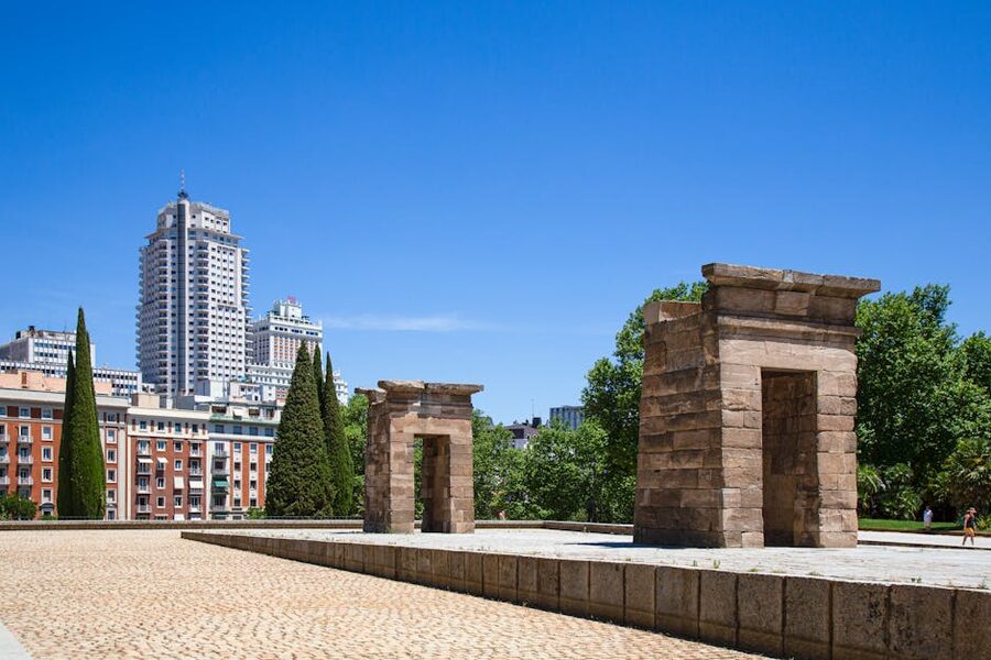 Temple of Debod with Madrid skyline behind it