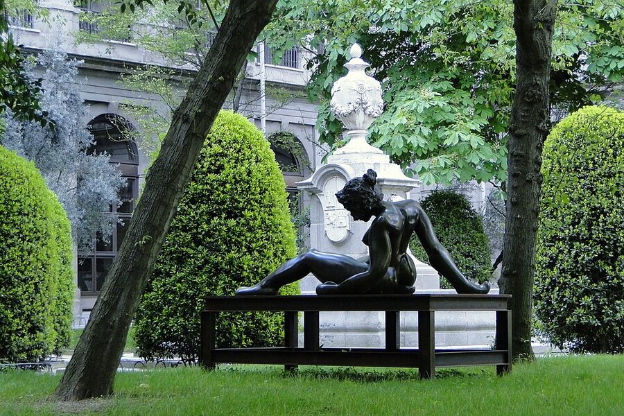 Reina Sofia museum garden with sculpture and bench