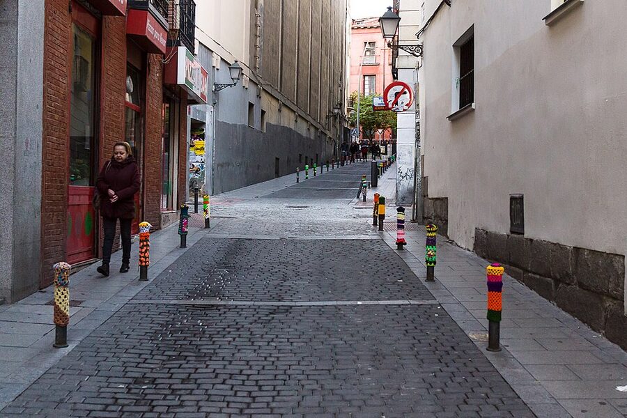 Calle de Lavapies Madrid street with shops and traffic