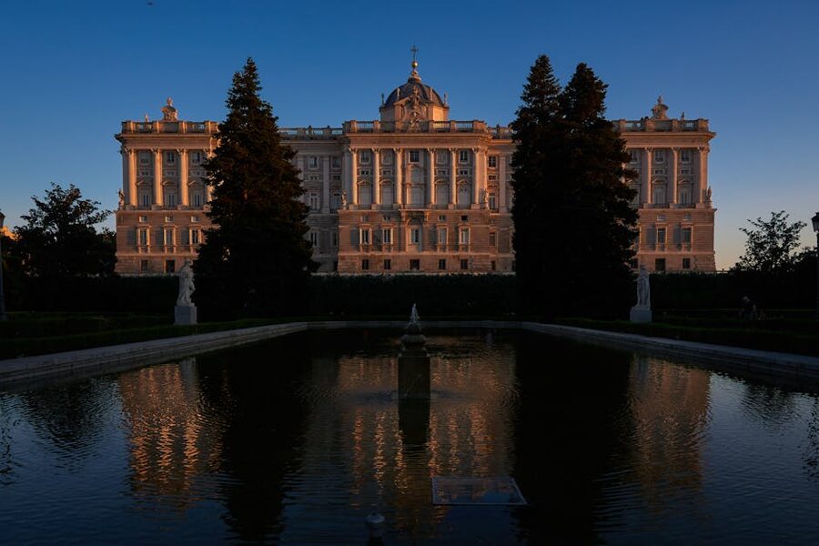 Royal Palace reflected in Sabatini Gardens pool at twilight