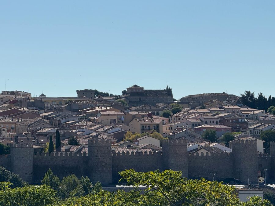 Avila medieval walls under blue sky Spain