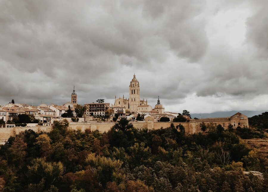 Segovia Cathedral dramatic clouds Spain