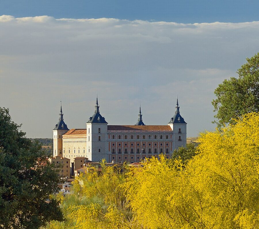 Alcazar of Toledo fortress on hilltop with stone facade