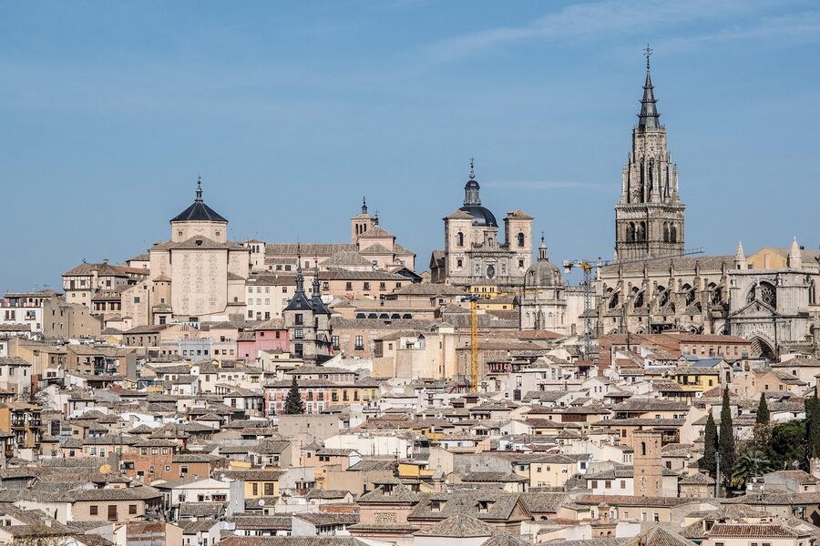 Toledo Cathedral exterior with medieval architecture and bell tower