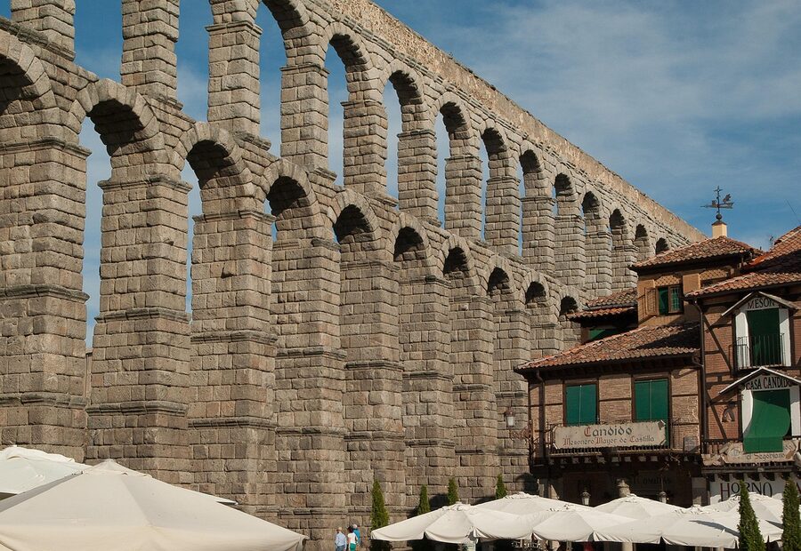 Roman aqueduct of Segovia stone arches close up