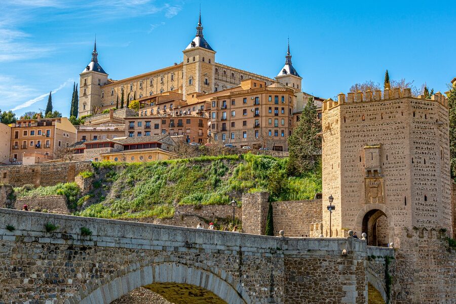 Toledo Alcantara bridge with Alcazar in background