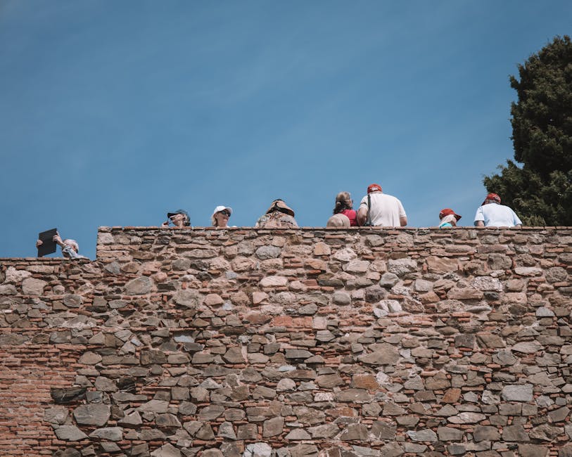 Visitors atop the Alcazaba walls in Malaga