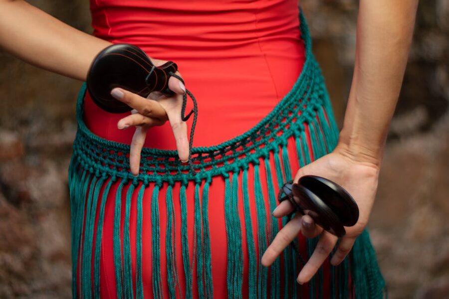 Flamenco castanets close-up in dancer hands
