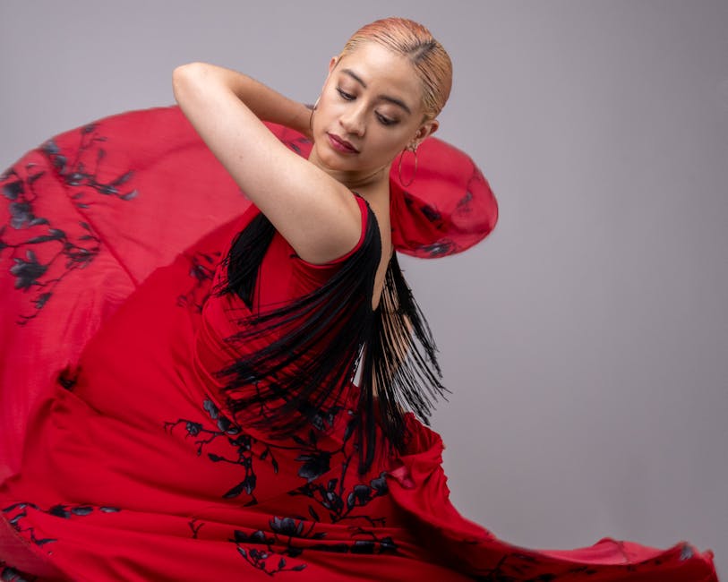 Flamenco dancer in red dress mid-performance