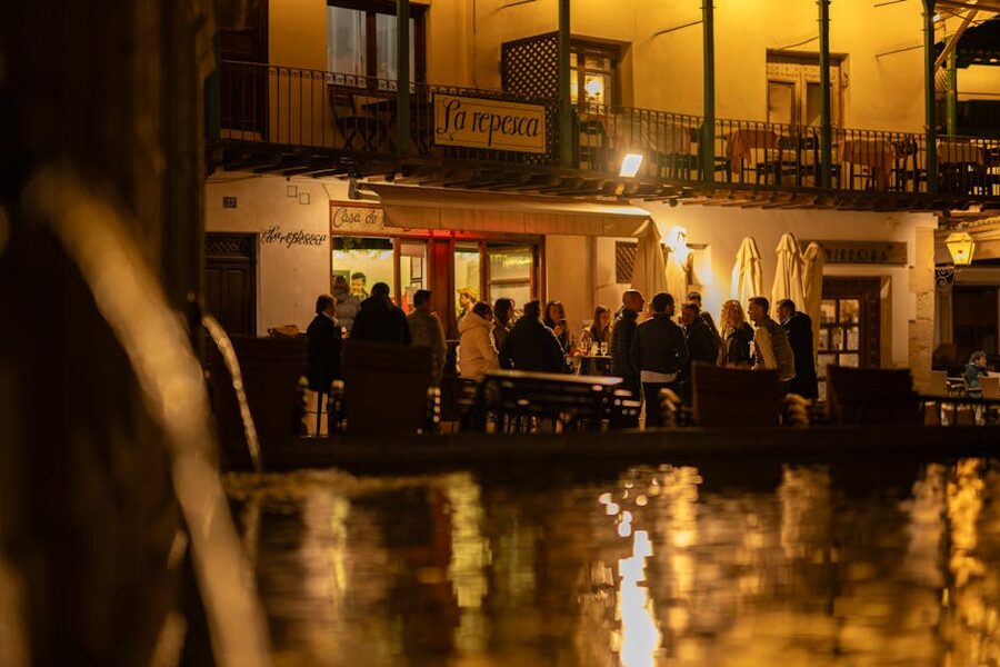 Spanish evening plaza with friends gathered