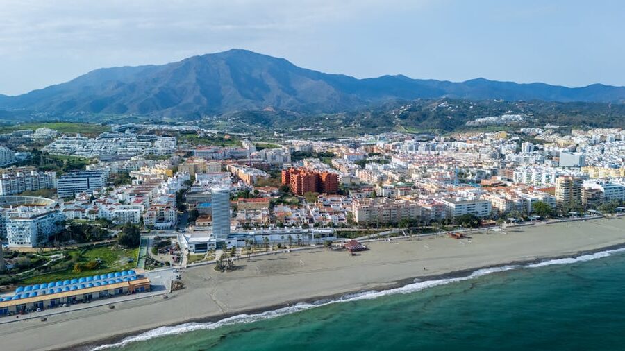 Estepona beachfront cityscape with mountains behind on the Costa del Sol