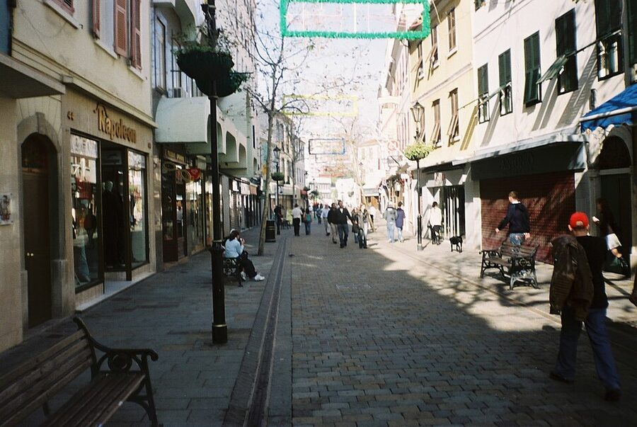 Main Street pedestrian area in Gibraltar with shoppers and shopfronts