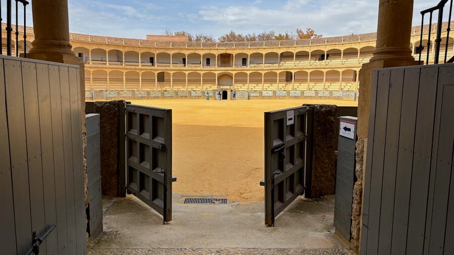 The historic bullring entrance Plaza de Toros in Ronda Spain