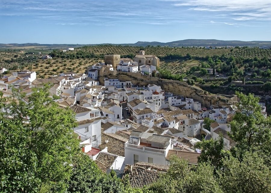 White architecture of Setenil de las Bodegas with rock and cliffs