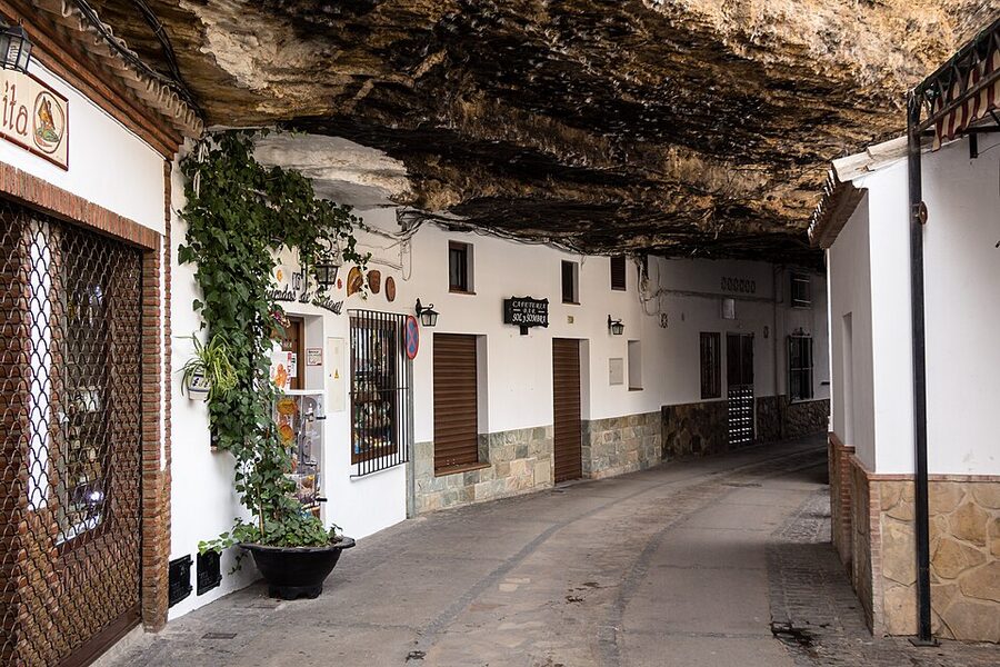 Vista of Setenil de las Bodegas with white houses cliffsides and rock formations