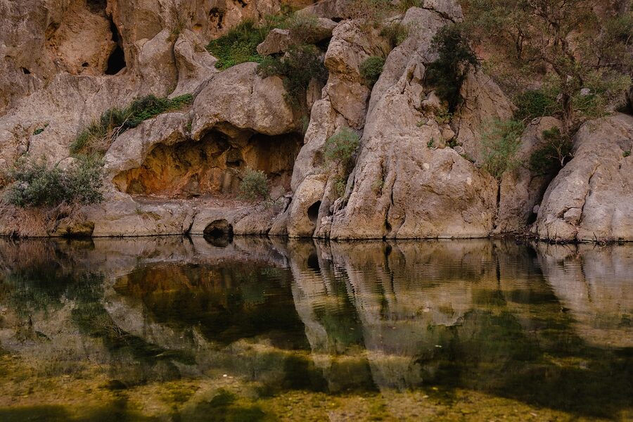 Rock formations and underground lake at a Mallorca cave