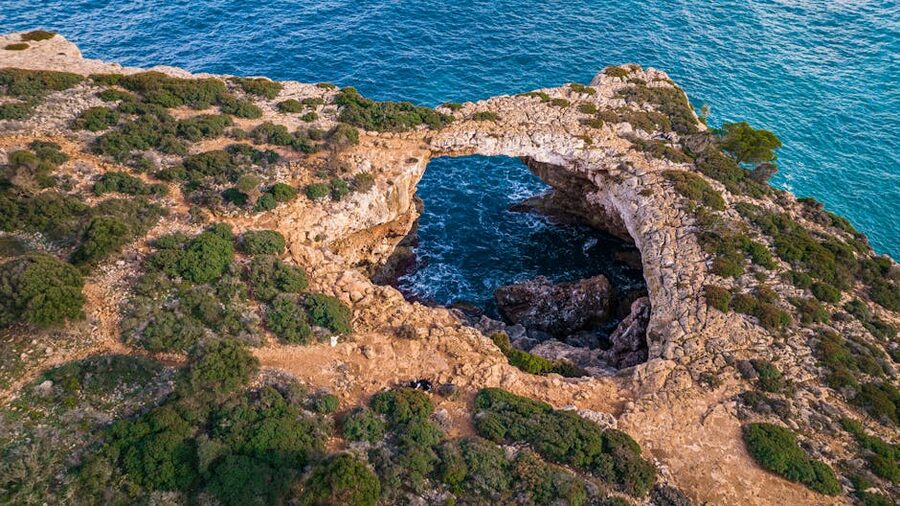 Natural rocky arch on the Mallorca coastline