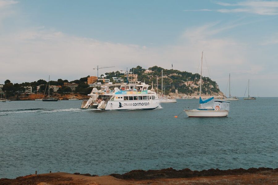 Cormoran passenger ship and yachts on the Mallorca coast