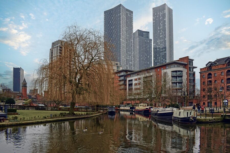 Castlefield canal boats and converted warehouses Manchester