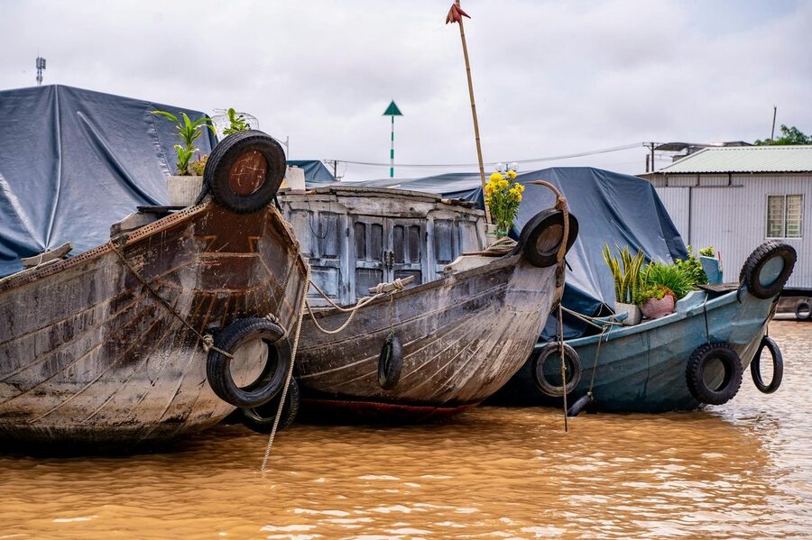 Boats loaded with goods at the Mekong Delta floating market