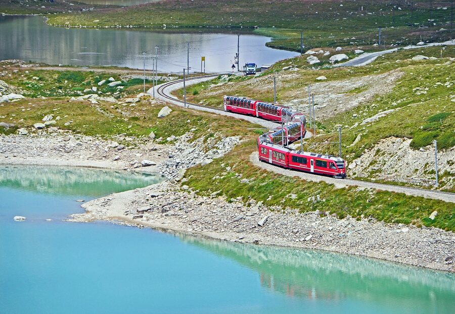 Bernina Pass railway snaking through Swiss Alps near Lago Bianco