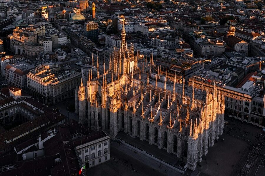 Milan Duomo landmark with surrounding buildings