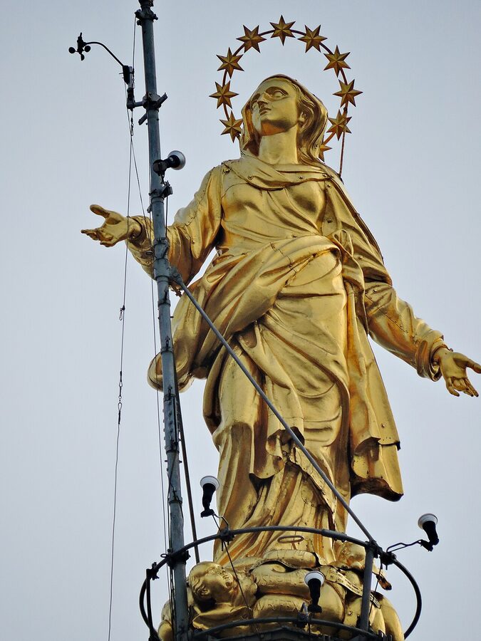 La Madonnina gilded statue on Milan Duomo